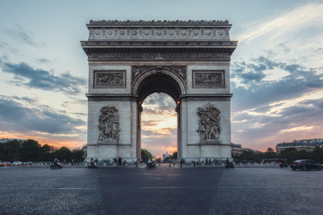 Fototapeta na wymiar Spectacular View the Triumphal Arch at sunset. Paris, France. Travel background.