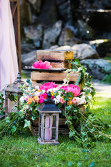 An authentic vibrant floral decoration. Wedding decoration concept. Colorful summer decor.