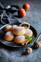Homemade buns filled with poppy seeds and apple
