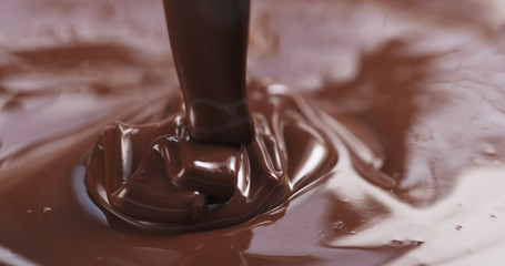pouring dark melted chocolate