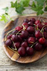 Fresh cherry on wooden desk