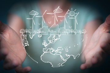 Businesswoman touching and holding renewable energy sketch