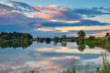 Foto op Canvas Beautiful summer landscape. Pond in the countryside in fabulous evening colors. © shadowmoon30