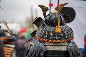 Samurai armour and helmet. Carnival costumes. Soldiers on outside