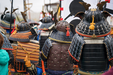 Samurai armour and helmet. Carnival costumes. Soldiers on outside