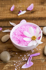 Bath salt bowl, spa setting with salt and flowers