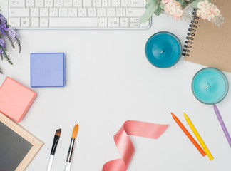 Flat lay, top view office table desk frame. feminine desk workspace with laptop, watch on white background.Love concept top view composition.note for somthing in love emotin.