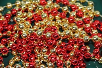 pineapples golden pearls and red bows and Christmas bells