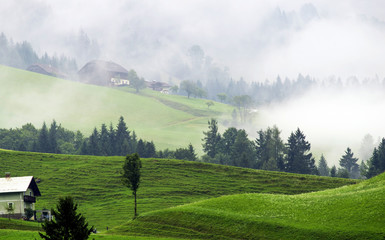 A small Austrian village on a foggy morning.