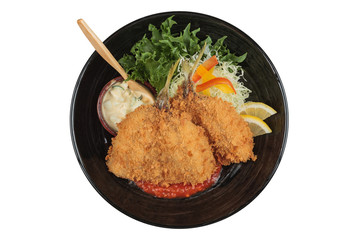 Isolated top view of Fried tempura whiting fish or asohos with home made tomato sauce served with sliced cabbage, lettuce, lemon and egg salad in round black plate.