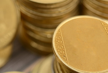 Closeup of Golden Coins Pile - Earning concept