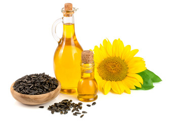 Sunflower oil, seeds and flower isolated on white background