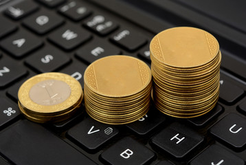 Golden Coins Graph going up on Keyboard Online Trading