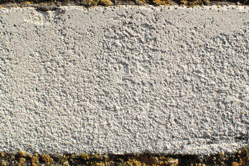 Close-up texture of fragment of an old white brick wall with building seams. Texture of one brick.