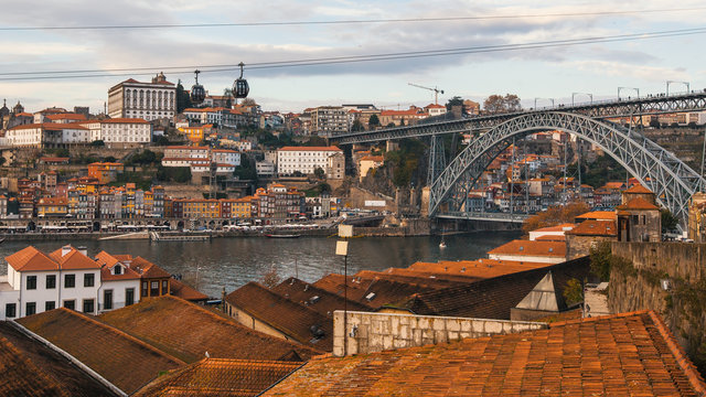 Roofs Vila Nova de Gaia, the Douro river, Ribeira and Dom Luis I bridge, Porto, Portugal.