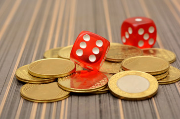 Gold Currency Coins with Red Dice