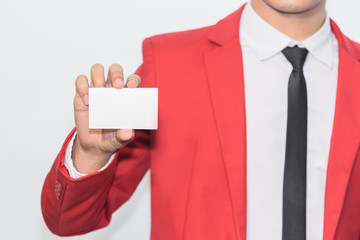 Man holding white business card on white background