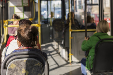 Passengers go to the bus around the city