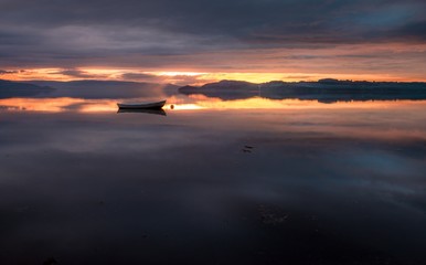 Fototapeta na wymiar Fishing Boat in Sunset in Norway