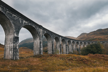 Fototapeta na wymiar Antique aqueduct - glenfinnan viaduct, Scotland, United Kingdom
