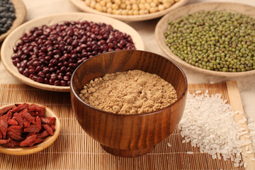 Black rice ,rice, millet, beans, goji (wolfberry)， and grind up those to make some kind of healthy food flour. It is a popular food in China, and named wugufen. 