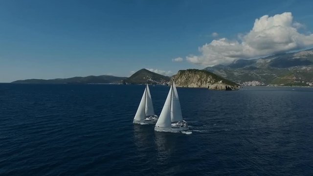 Aero shooting of two yachts in the open sea