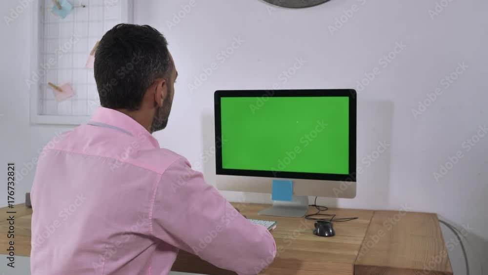 Aufkleber happy smiling businessman turns and looking at the camera showing thumb signal thumbs-up. handsome m