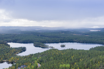 Fototapeta premium Mountains, forests, lakes view in autumn. Fall colors - ruska time in Konttainen. One part of Karhunkierros Trail. National park in Finland. Lapland, Nordic countries in Europe