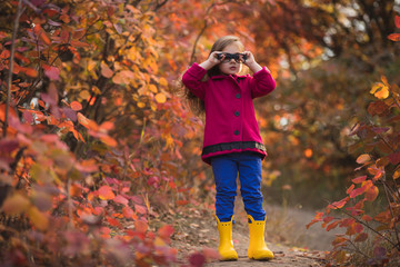 Little girl in big fake eyeglasses