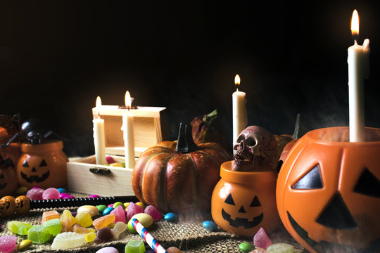 halloween party night with candle light and smoke