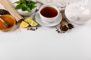 Obraz na płótnie Canvas Beautiful arrangement of tea spices on table