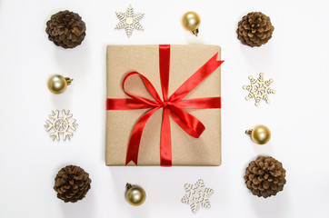 Christmas holidays and Happy New Year background. Gift boxes with red ribbon and Christmas decoration on wooden table.