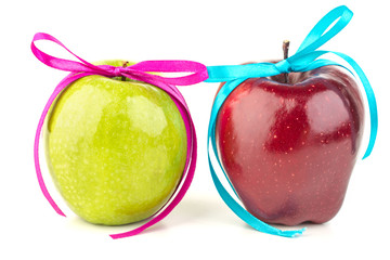 Bright ripe apples and colored ribbons