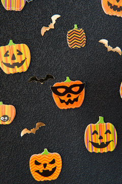Halloween - pumpkins, on a dark background 