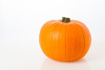 Halloween - pumpkin, on a light background. 