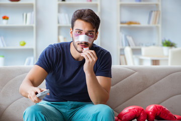 Young man defeated in sports game suffered loss with broken blee