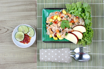 Fried  rice with mixed vegetable and side dish.