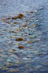 The coast, with stone boulders. Barents sea, Russia.