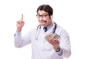 Young doctor with phone headset isolated on white