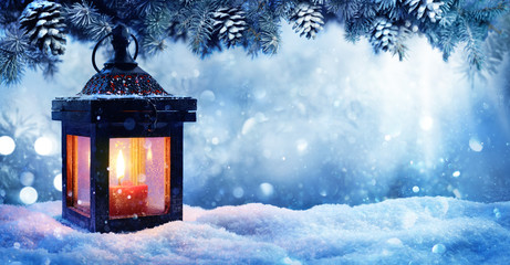 Christmas Lantern On Snow With Fir Branch In Evening Scene   © Romolo Tavani
