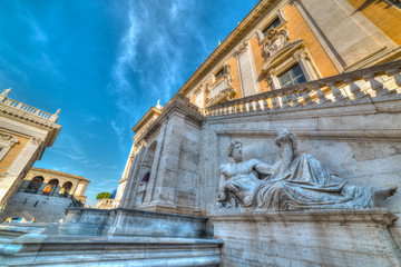 Tiber statue by Campidoglio facade in Rome