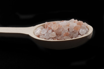 Fototapeta na wymiar Pink Salt Crystals Spoon