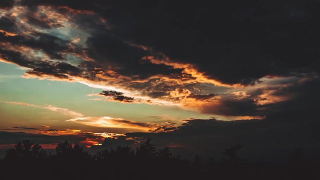 Time lapse clip of cloudy sunset