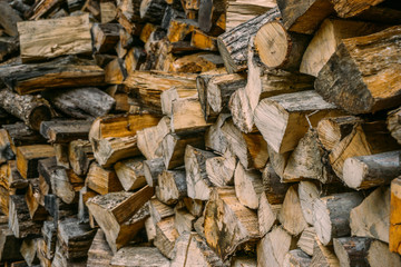 Pile of firewood, dry firewood background