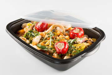 Lunch boxes with food on a white background