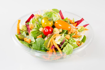 Takeaway salad on white background
