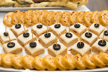 various canapés served on the table, close up