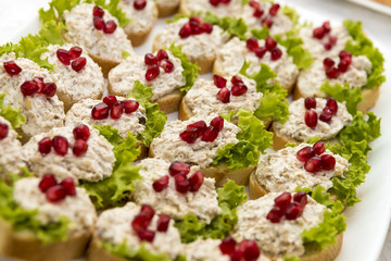 various canapés served on the table, close up