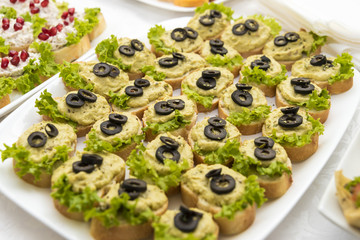 various canapés served on the table, close up