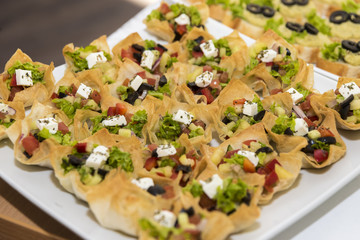 various canapés served on the table, close up